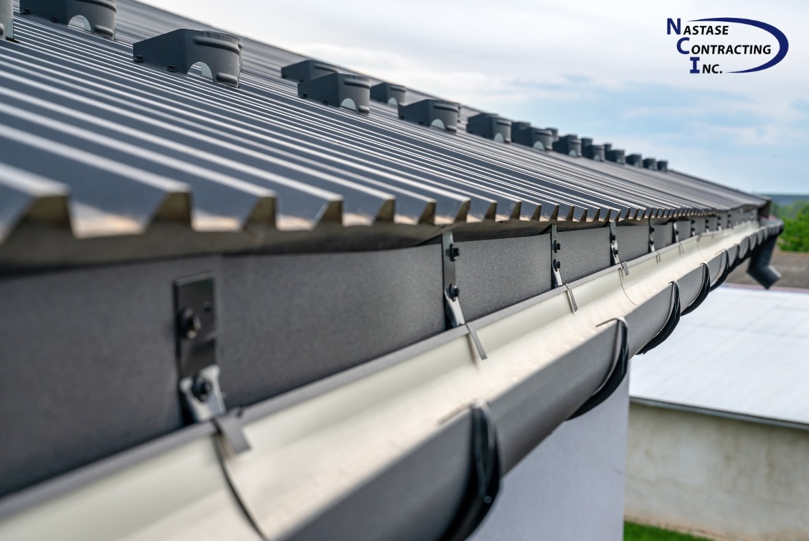 side view of a gutter and roof from commercial roofing companies like nastase contracting in Omaha
